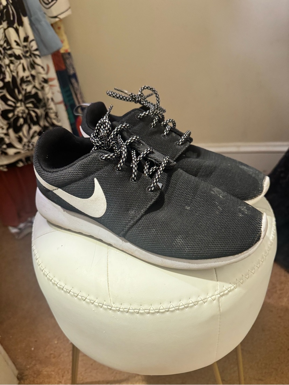 Nike Women’s Black Low-Top Running Sneakers with White Swoosh